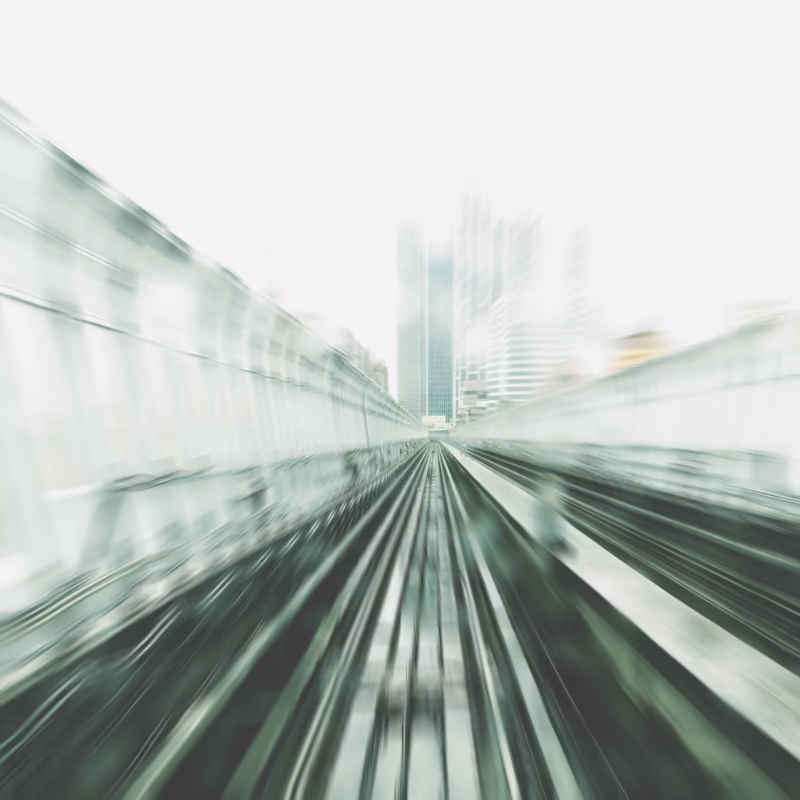 Train tracks with motion blur - adopting AI backwards metaphor showing speed and direction